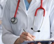 Doctor Documenting in tablet