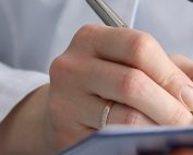 Doctor Documenting in tablet