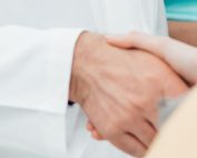 Doctor shaking patients hand