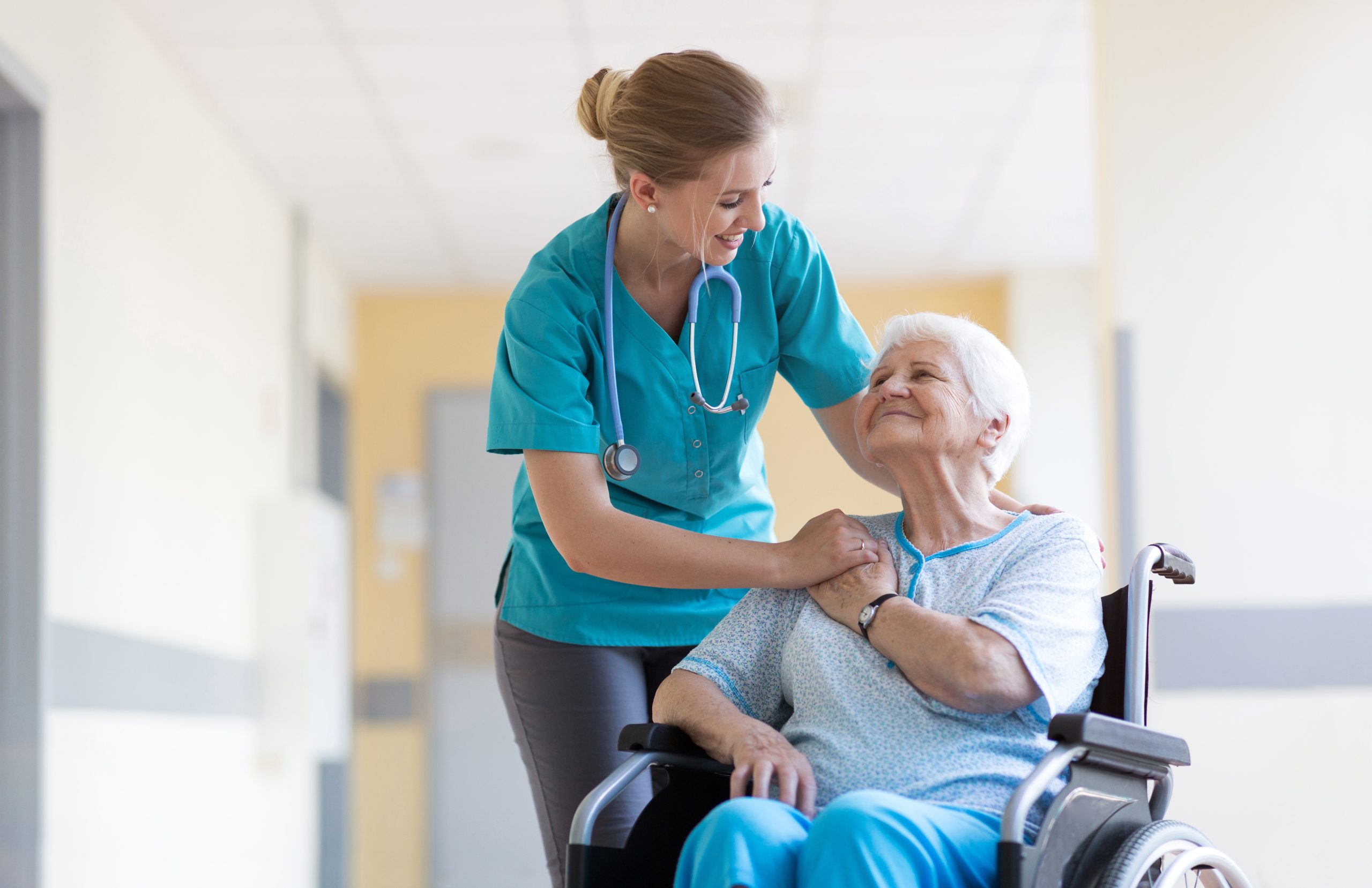 nurse elderly patient wheelchair